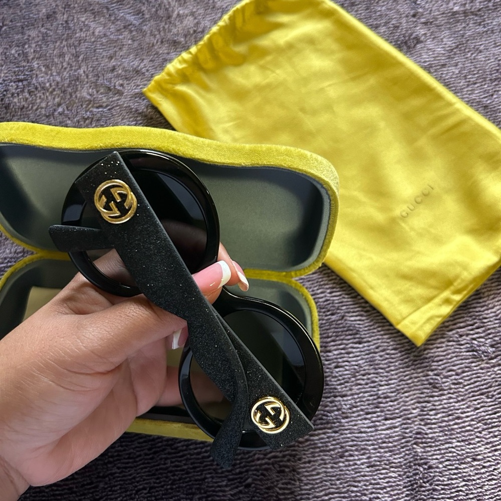 Gucci oversized oval black shiny sunglasses